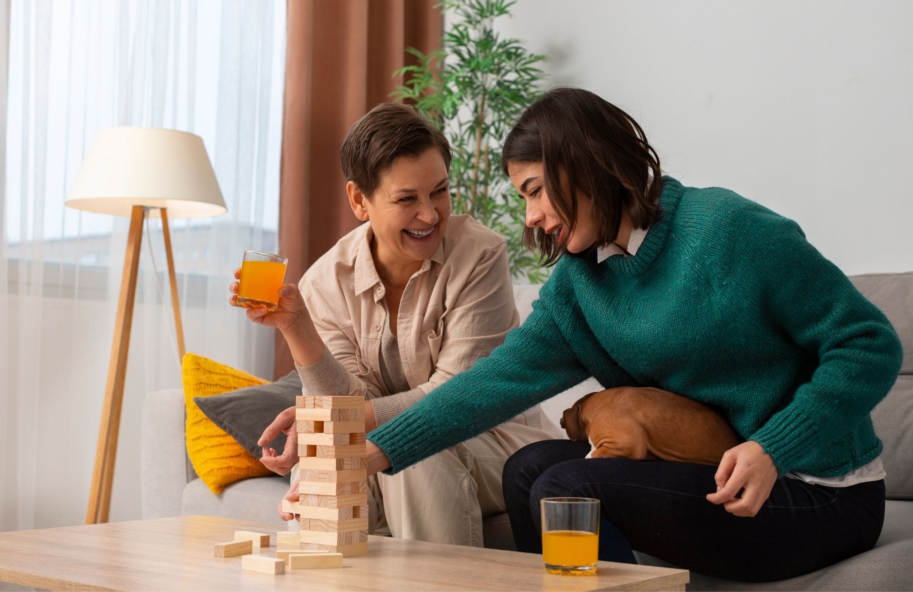 one mother anothe mother is enjoying their free time by playing games